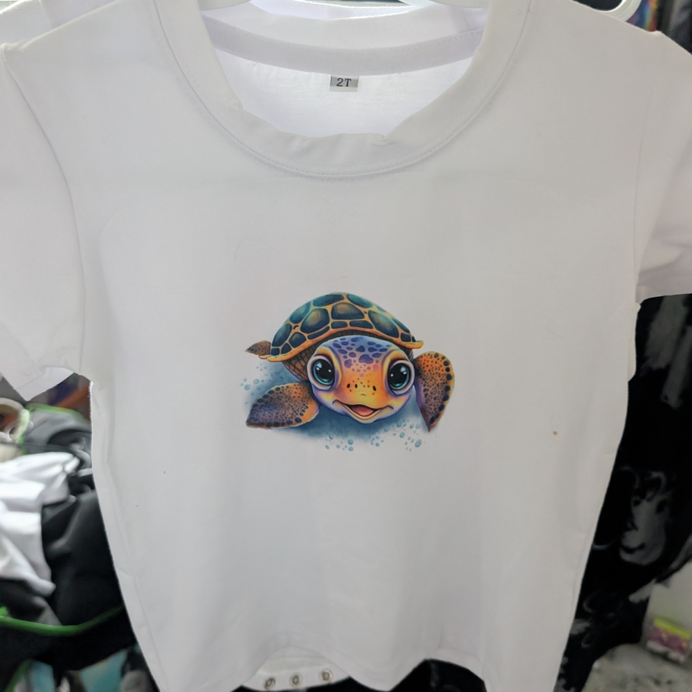 White T-Shirt with Colorful Turtle Design